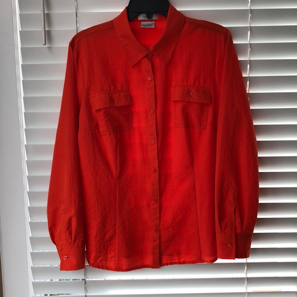 Orange blouse.